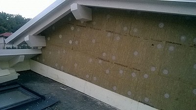 Posa del cappotto esterno in lana minerale